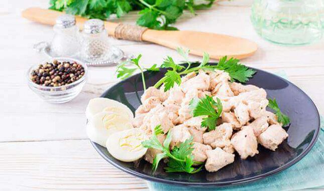 Stewed chicken fillet in a slow cooker a nutritious dinner on a low-carb diet